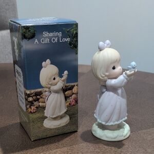 Figurine with Bow and Bird